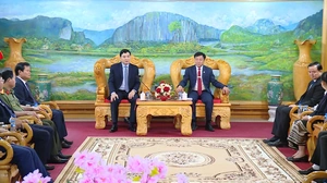 Chủ tịch UBND tỉnh Thanh Hóa chúc Tết cổ truyền Bunpimay tại tỉnh Hủa Phăn (Lào)