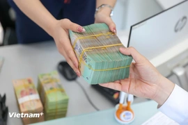 Từ 1/11, chuyển tiền từ 500 triệu đồng và 1.000 USD trở lên phải báo cáo