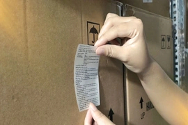 Gỡ rối bài toán in tem phụ hàng nhập khẩu