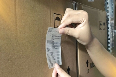 Gỡ rối bài toán in tem phụ hàng nhập khẩu