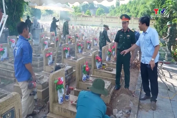Lấy và bàn giao mẫu hài cốt liệt sĩ tại Nghĩa trang liệt sĩ Thạch Thành